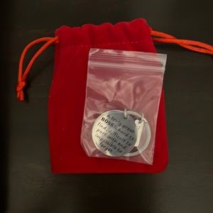 Great Boss key chain. Comes in velvet case